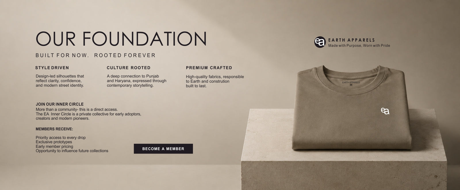 A folded taupe crewneck t-shirt displayed on a concrete pedestal against a beige background, with promotional text on the left reading 'OUR FOUNDATION' and 'EARTH APPAREL' at the bottom.